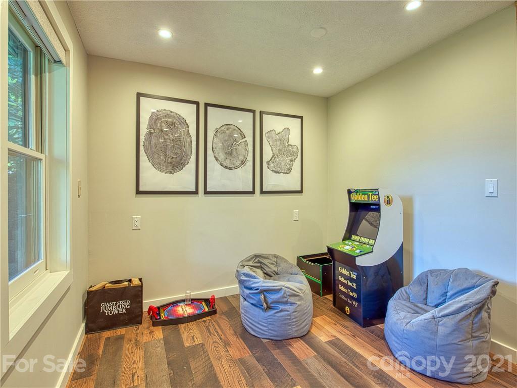 1933 Laurel Ridge North Maggie Valley, NC 28751 - Photo 37 of 44 a bedroom with furniture and a window