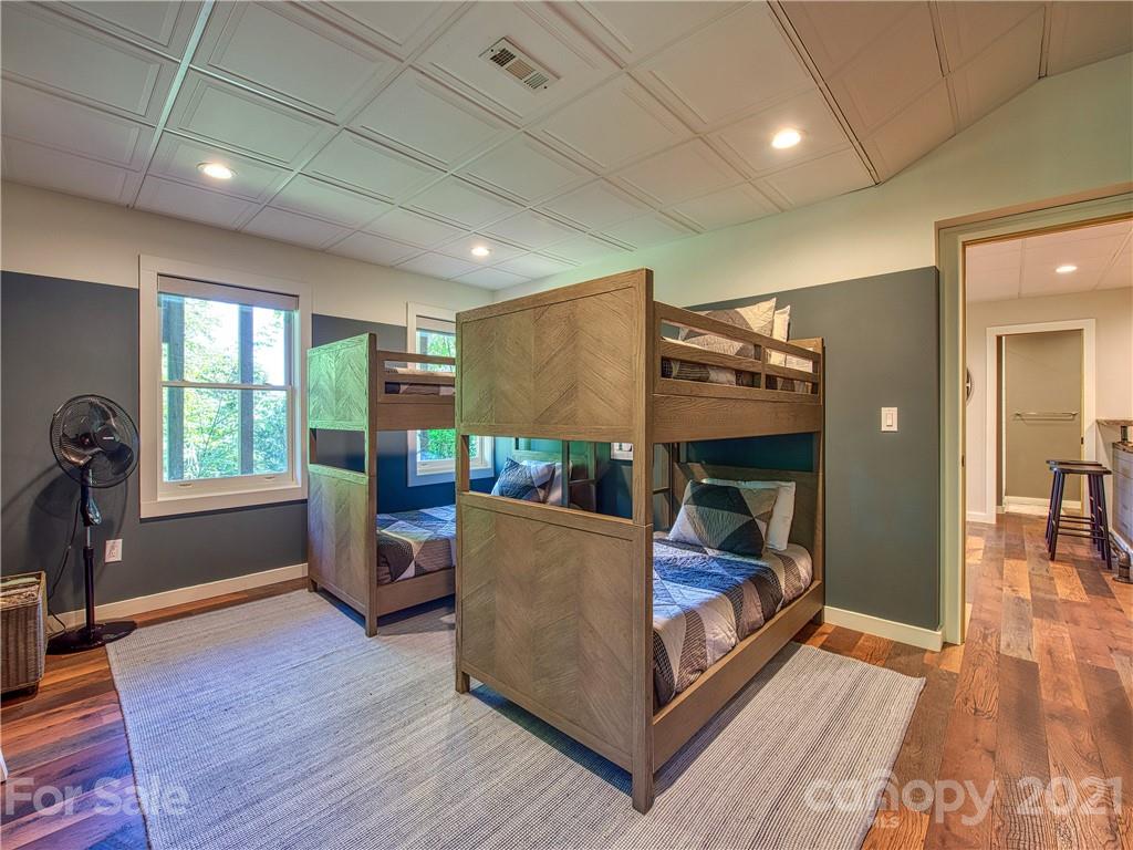 1933 Laurel Ridge North Maggie Valley, NC 28751 - Photo 38 of 44 a living room with furniture a window and a flat screen tv