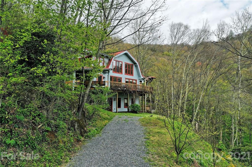 1933 Laurel Ridge North Maggie Valley, NC 28751 - Photo 43 of 44 a view of house with a yard and entertaining space