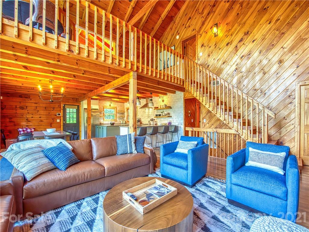 1933 Laurel Ridge North Maggie Valley, NC 28751 - Photo 9 of 44 a blue couch sitting in front of a building