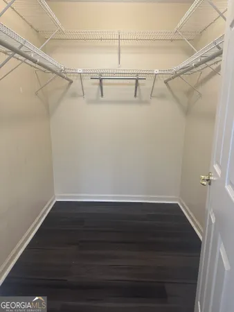 a view of a room with racks on the wall