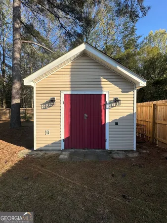 a view of a house with a garage