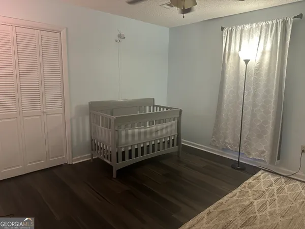 a room with a bed and a window