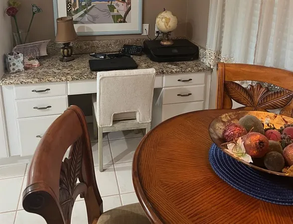 a kitchen with a stove and cabinets