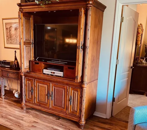 a living room with chairs