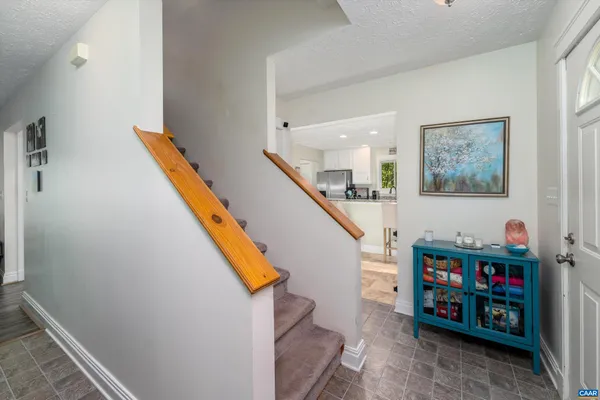 a bedroom with a bed and a cabinets