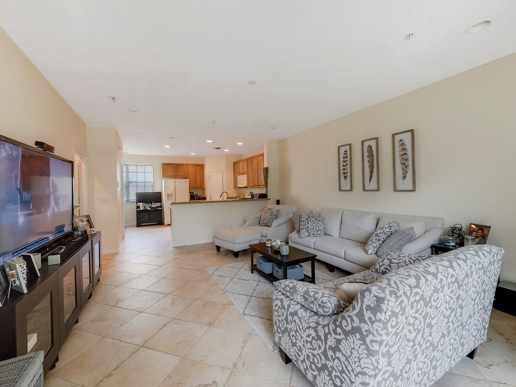 439 School House Road Jupiter, FL 33458 - Photo 7 of 13 Living room and kitchen