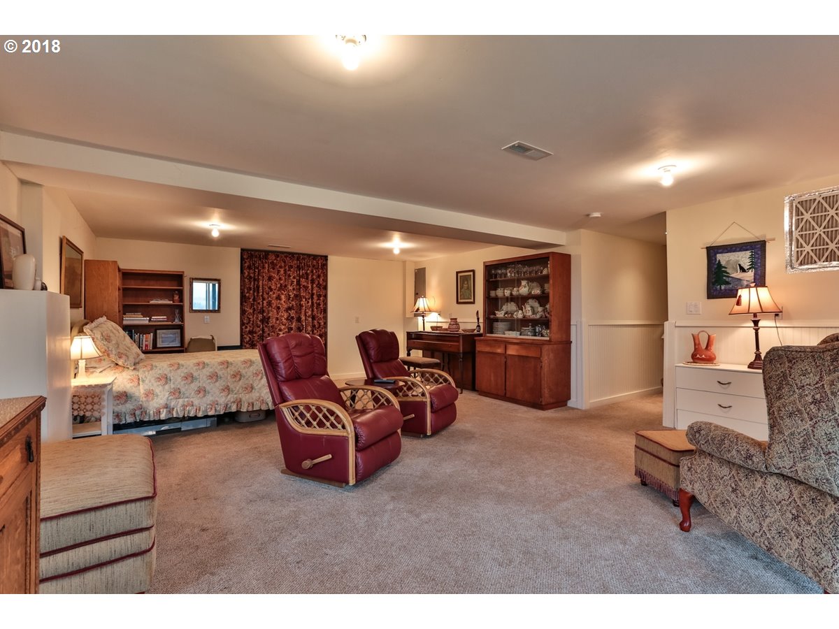 13205 Southwest Spring Hill Road Gaston, OR 97119 - Photo 21 of 30 a living room with furniture and a couch
