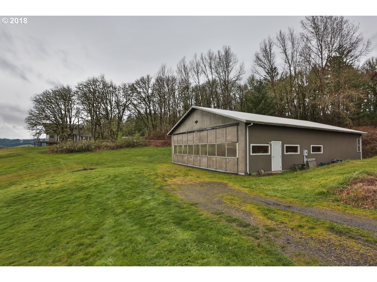 13205 Southwest Spring Hill Road Gaston, OR 97119 - Photo 26 of 30 a backyard of a house with lots of green space