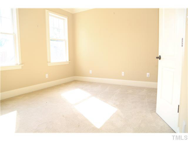 1816 Torrington Street Raleigh, NC 27615 - Photo 19 of 25 a view of a room that has a window in it