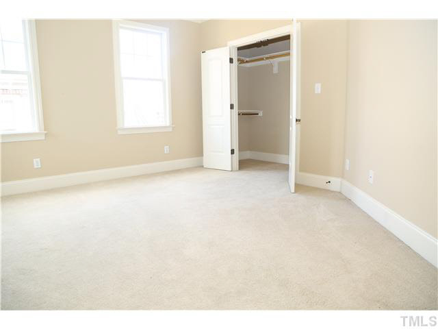 1816 Torrington Street Raleigh, NC 27615 - Photo 20 of 25 a view of an empty room with a window
