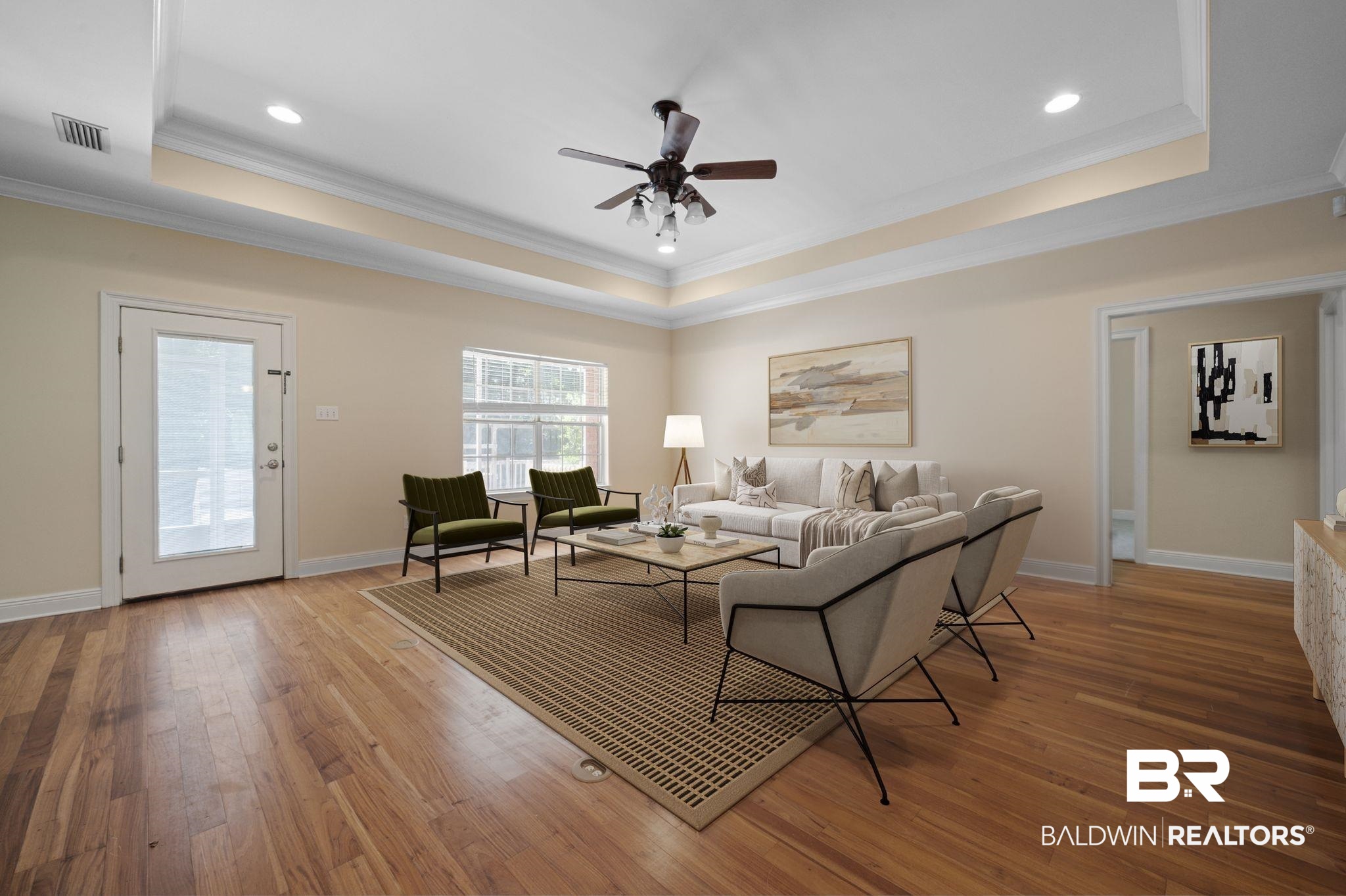 2041 Ridgeline Drive Mobile, AL 36695 - Photo 4 of 43 Living room featuring hardwood / wood-style floors, ceiling fan, a raised ceiling, and crown molding