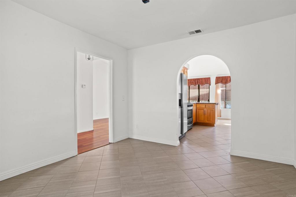 1387 Longfellow Road Vista, CA 92081 - Photo 16 of 38 a view of a livingroom with a furniture and a window