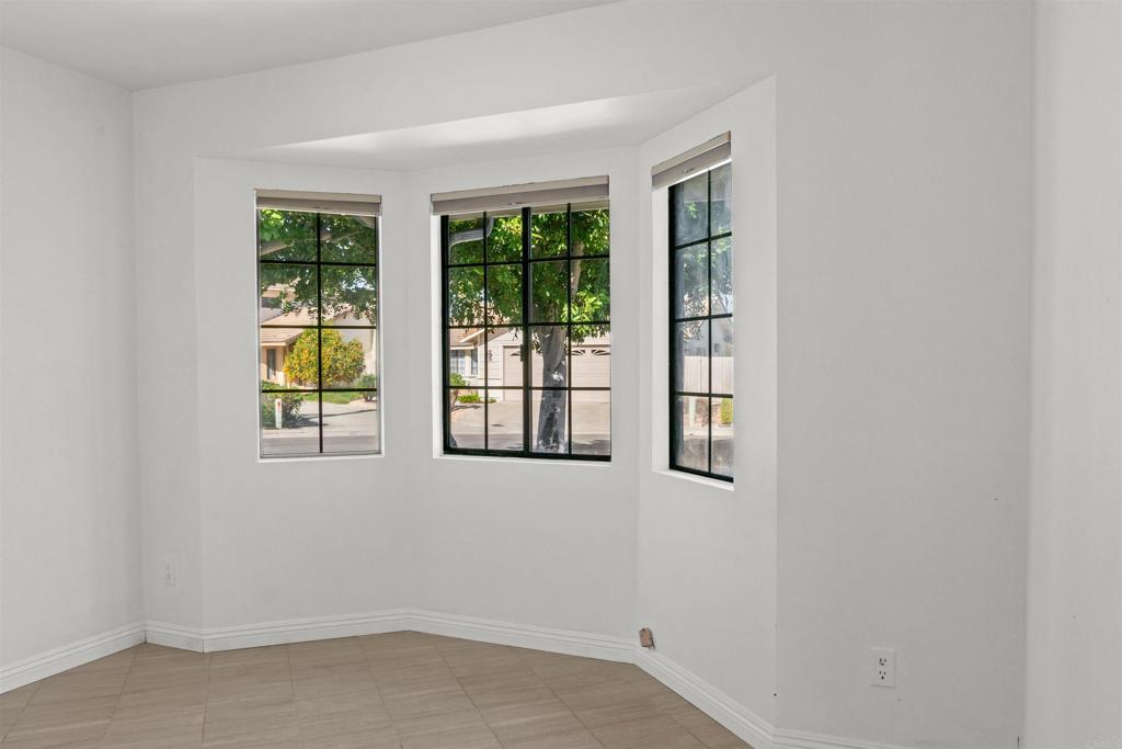 1387 Longfellow Road Vista, CA 92081 - Photo 17 of 38 an empty room with a window