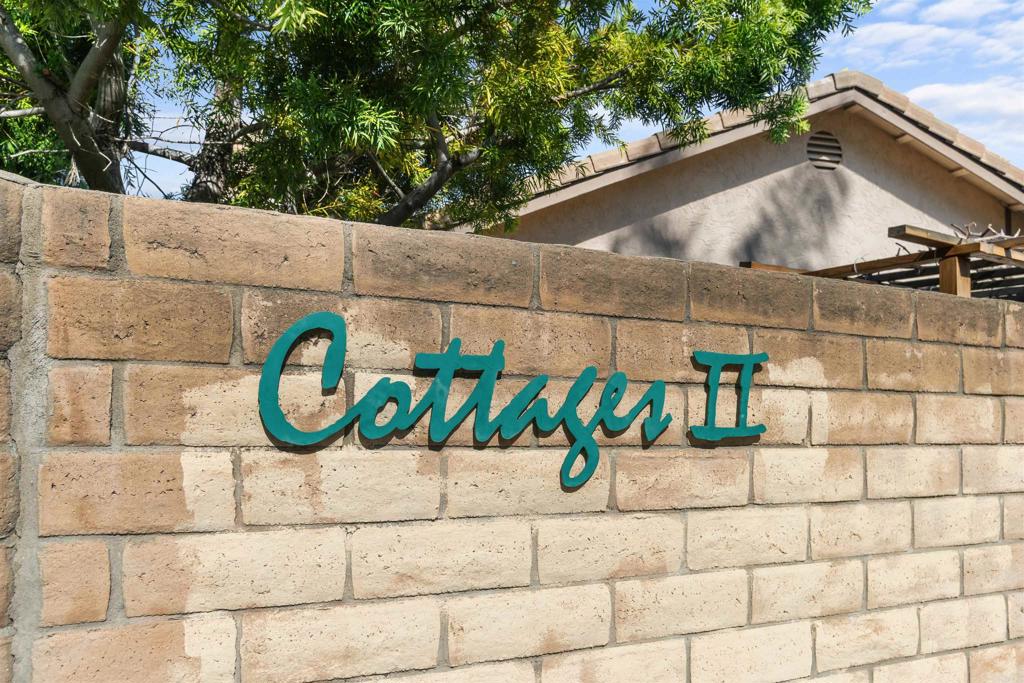 1387 Longfellow Road Vista, CA 92081 - Photo 37 of 38 a street sign on a wall next to a building