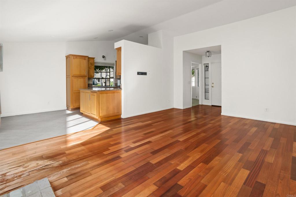 1387 Longfellow Road Vista, CA 92081 - Photo 7 of 38 a view of a livingroom with wooden floor