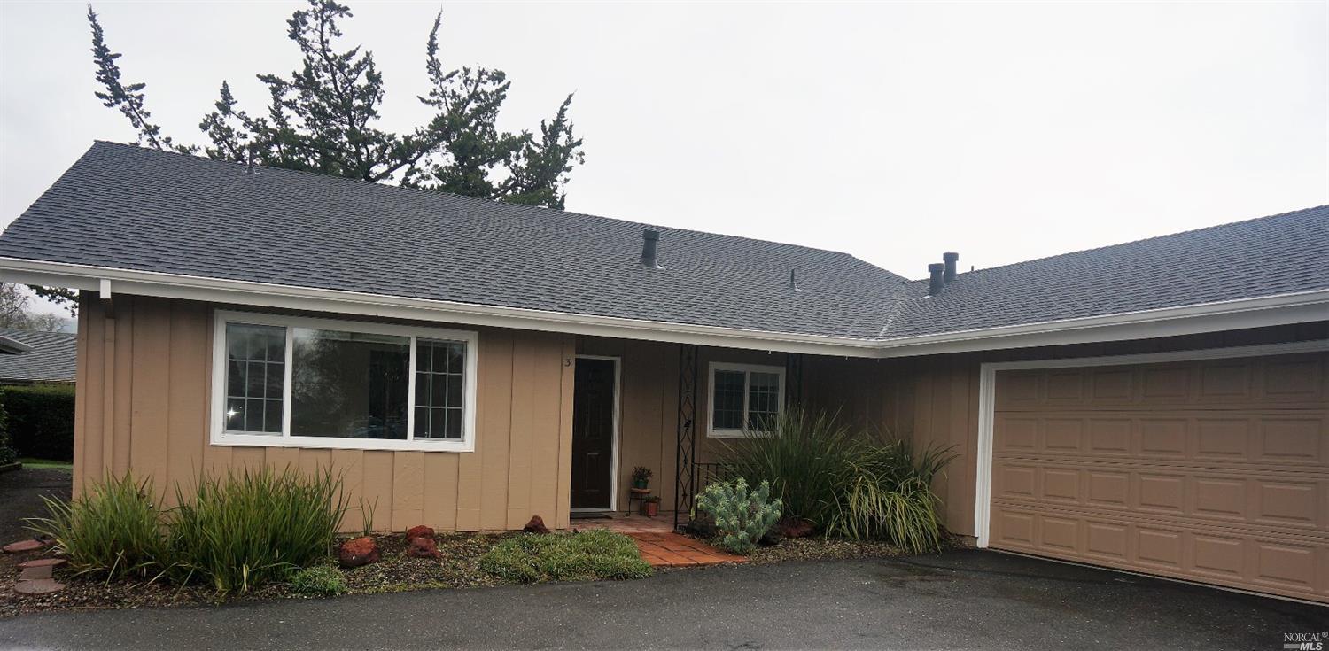 3 Oakgreen Santa Rosa, CA 95409 - Photo 1 of 1 a front view of a house with a yard