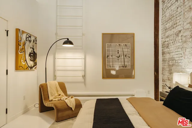 a view of a kitchen with refrigerator and cabinet