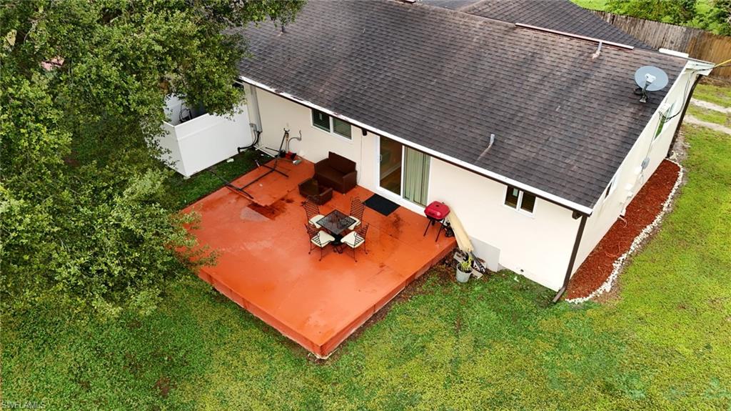 931 20th Street Southeast Naples, FL 34117 - Photo 20 of 21 an aerial view of a house with backyard space and deck