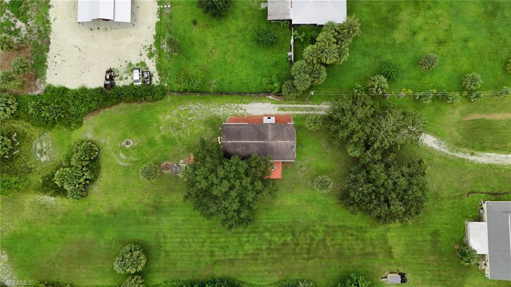 931 20th Street Southeast Naples, FL 34117 - Photo 21 of 21 an aerial view of a house with a yard
