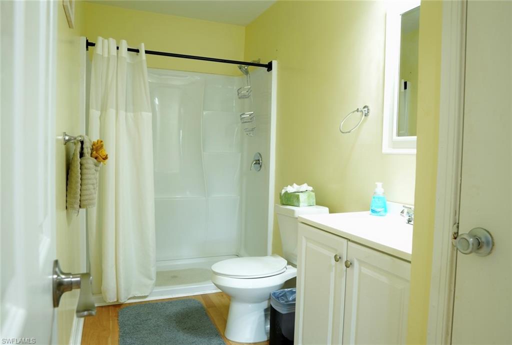 931 20th Street Southeast Naples, FL 34117 - Photo 8 of 21 a bathroom with a sink a toilet and shower