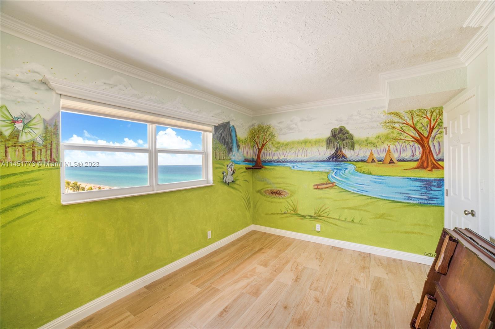 400 North Surf Road, Unit 801 Hollywood, FL 33019 - Photo 13 of 17 a view of a room with wooden floor