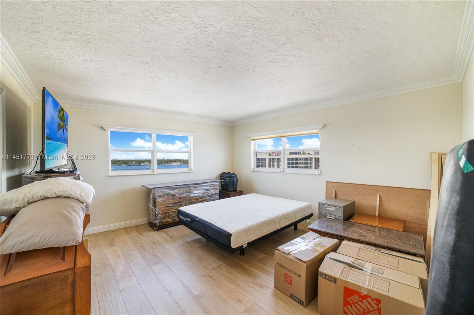400 North Surf Road, Unit 801 Hollywood, FL 33019 - Photo 14 of 17 a living room with furniture and a window