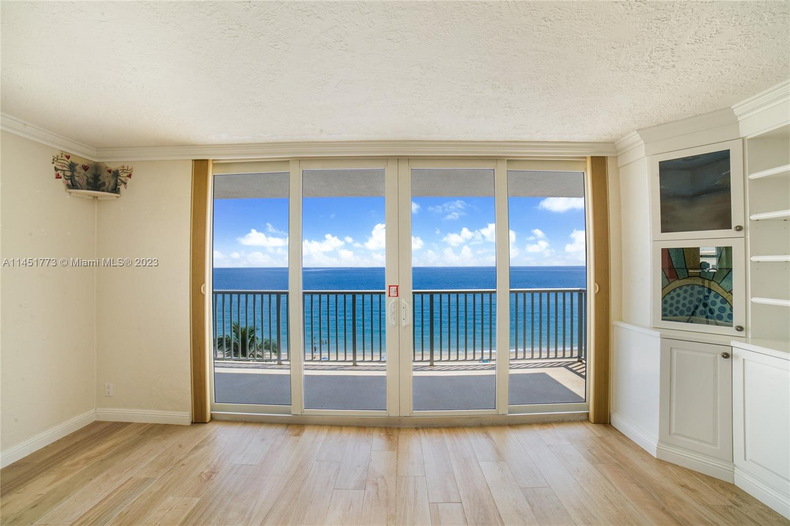 400 North Surf Road, Unit 801 Hollywood, FL 33019 - Photo 16 of 17 a view of wooden floor and a window in a room