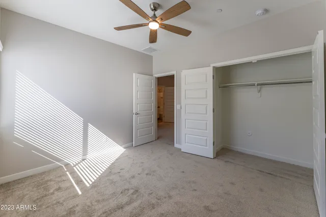 a front view of a house with garage