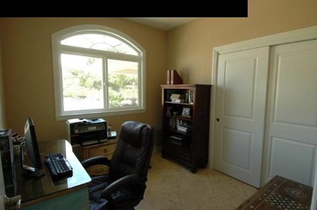 220 North Holokai Road Haiku, HI 96708 - Photo 12 of 29 a view of a workspace with furniture and a window