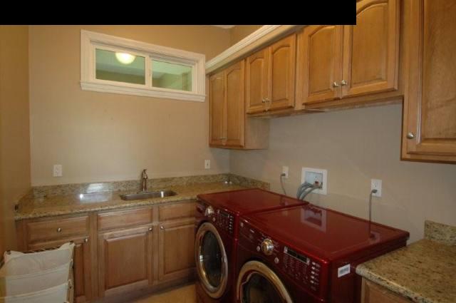 220 North Holokai Road Haiku, HI 96708 - Photo 21 of 29 a utility room with dryer and washer