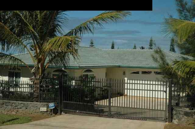 220 North Holokai Road Haiku, HI 96708 - Photo 26 of 29 a view of a house with a iron gate