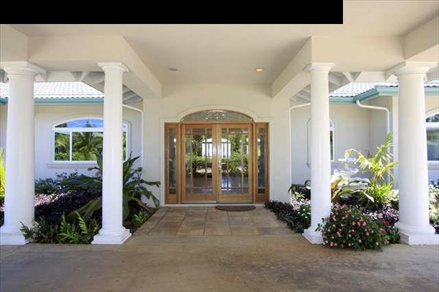 220 North Holokai Road Haiku, HI 96708 - Photo 3 of 29 a front view of a house with a porch
