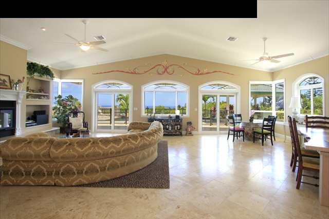 220 North Holokai Road Haiku, HI 96708 - Photo 4 of 29 a large living room with fireplace furniture and a large window