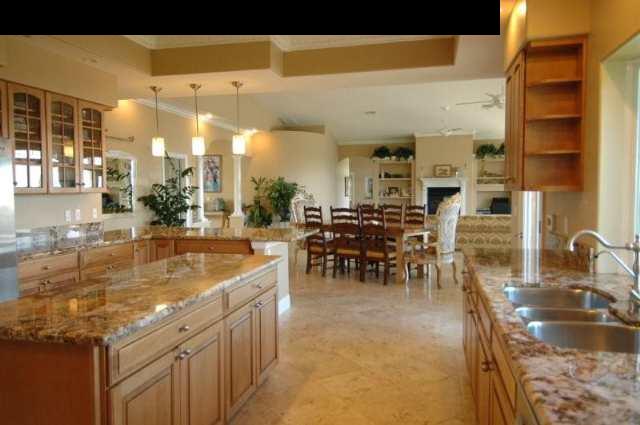 220 North Holokai Road Haiku, HI 96708 - Photo 5 of 29 a dining hall with stainless steel appliances granite countertop a sink and a large window