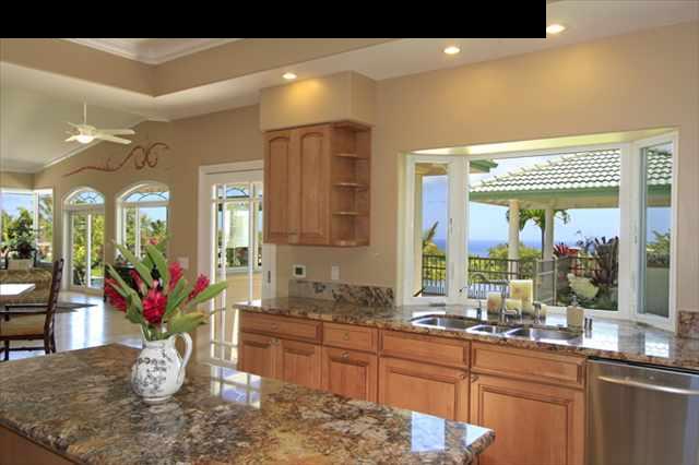 220 North Holokai Road Haiku, HI 96708 - Photo 6 of 29 a large bathroom with a granite countertop sink a large mirror and a shower