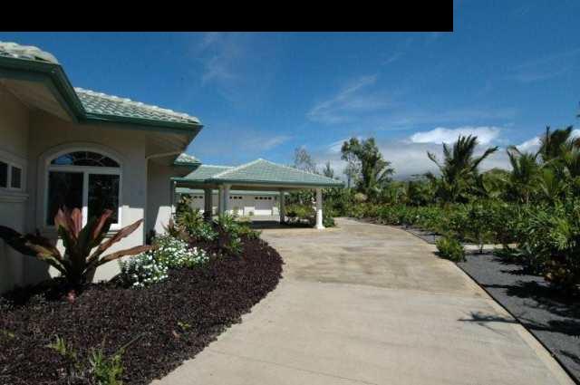 220 North Holokai Road Haiku, HI 96708 - Photo 9 of 29 a front view of a house with garden