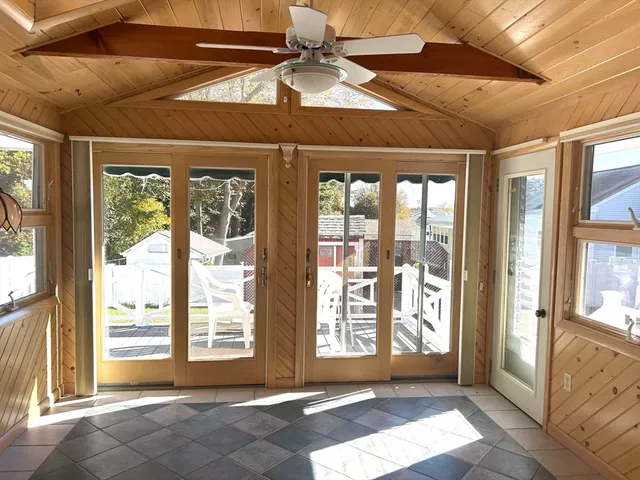 a view of a room with large windows