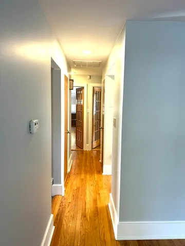 a view of a bathroom with a tub and shower