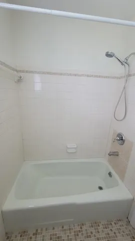 a view of a fountain in front of house