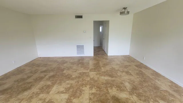 a kitchen with a sink and a window