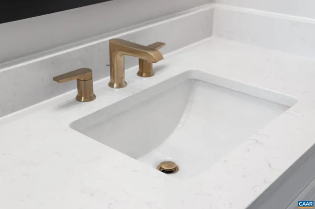 a spacious bathroom with a double vanity sink a large mirror a shower and a bathtub