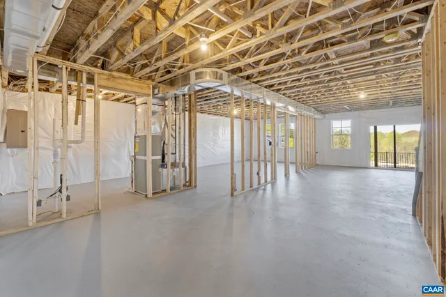 a view of a room with wooden walls