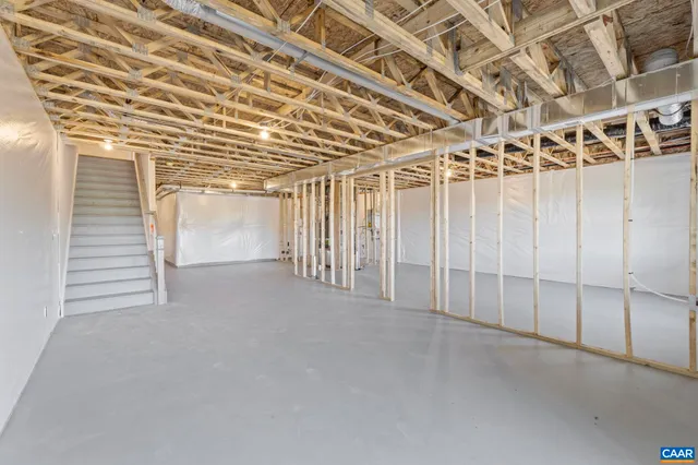 a front view of a residential apartment building with a yard