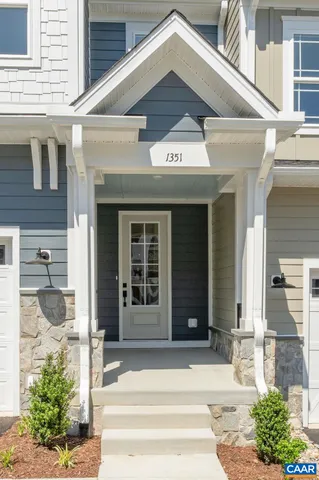 a view of brick building with a entrance door