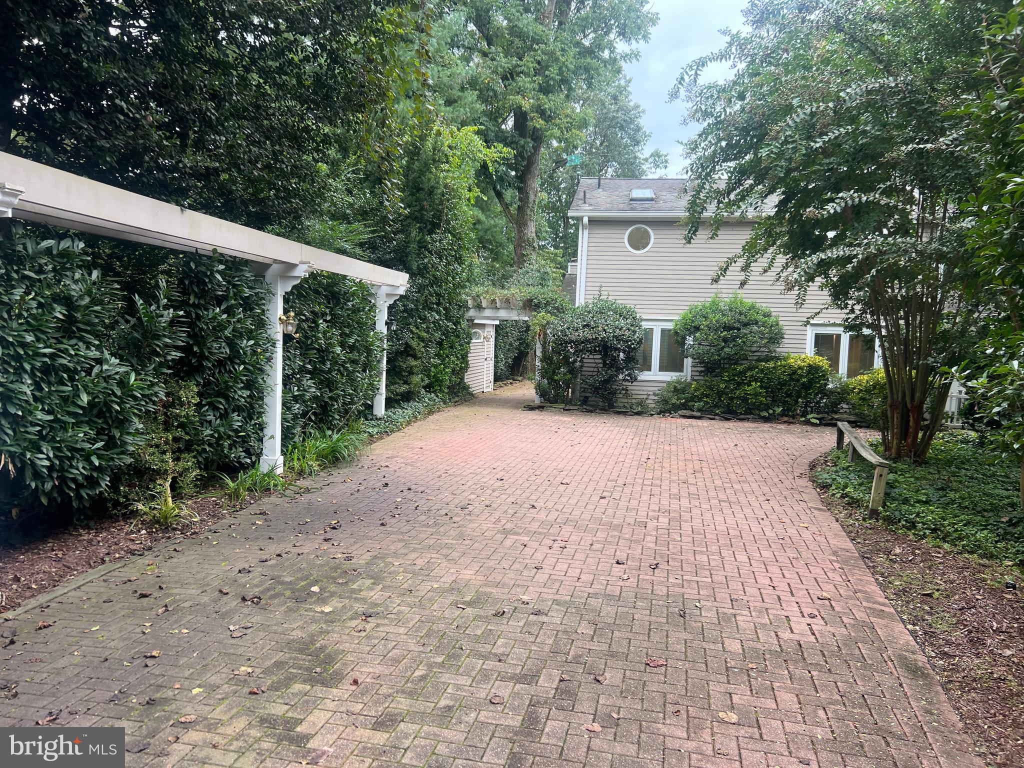 111 Virginia Avenue Edgewater, MD 21037 - Photo 19 of 80 a view of a house with a yard and pathway