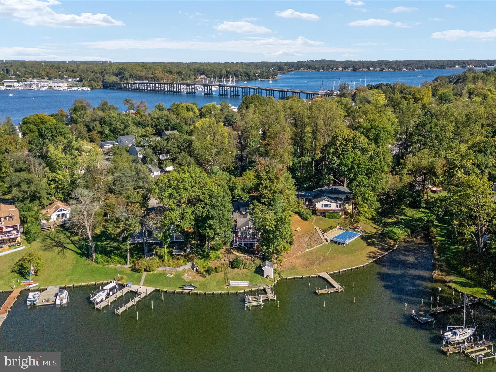 111 Virginia Avenue Edgewater, MD 21037 - Photo 27 of 80 an aerial view of residential houses with outdoor space and trees