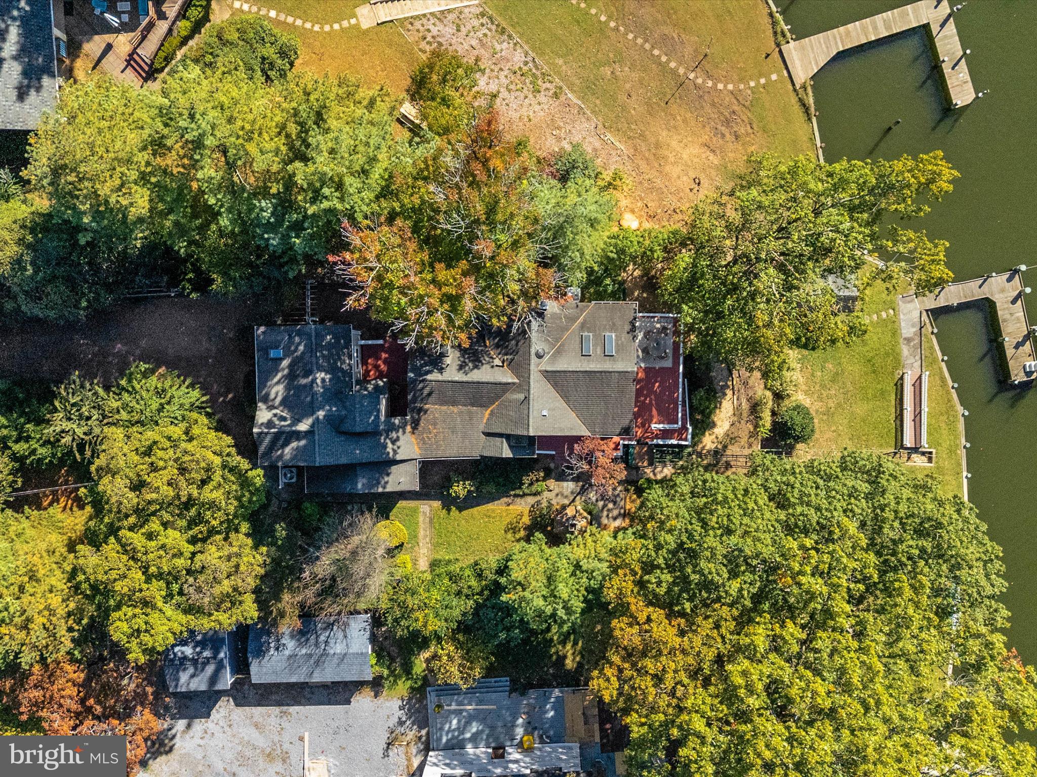 111 Virginia Avenue Edgewater, MD 21037 - Photo 29 of 80 a view of a house with a yard and a pool