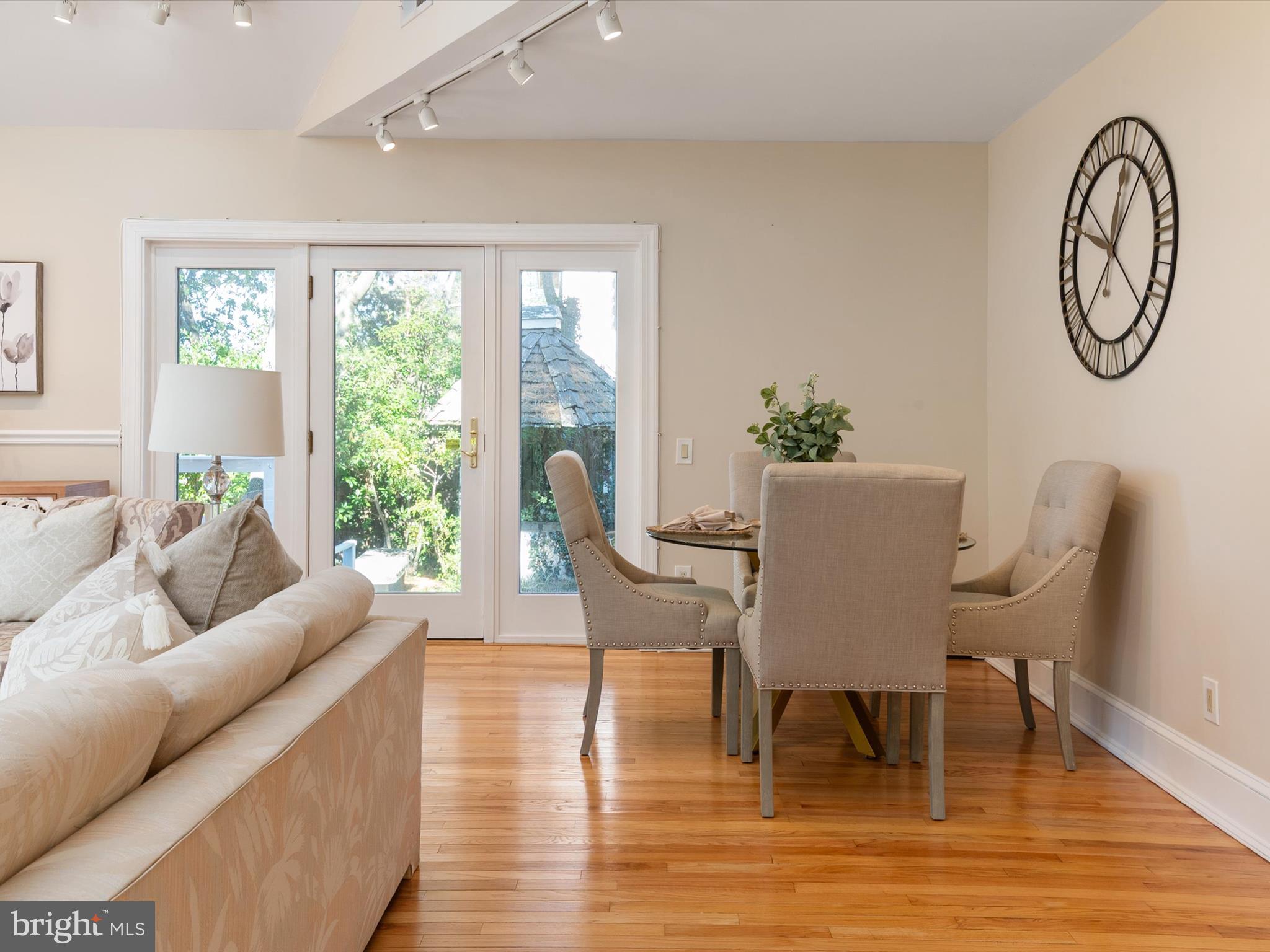 111 Virginia Avenue Edgewater, MD 21037 - Photo 40 of 80 a view of a dining room with furniture window and wooden floor