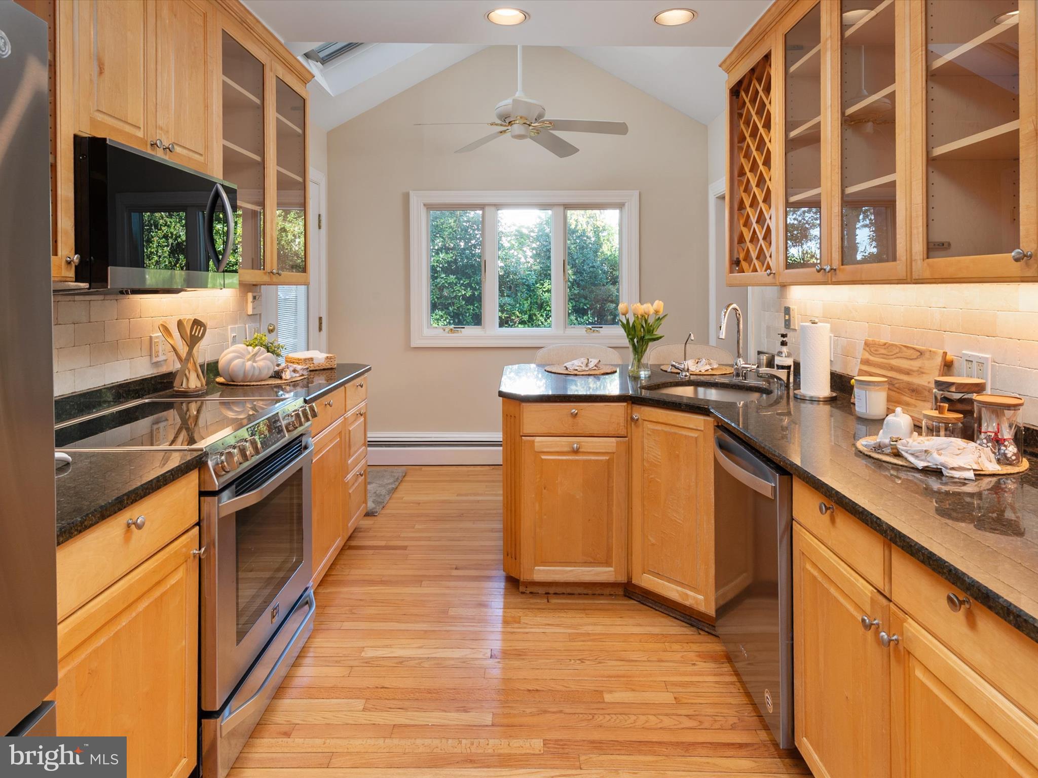 111 Virginia Avenue Edgewater, MD 21037 - Photo 4 of 80 a kitchen with stainless steel appliances a sink stove and cabinets